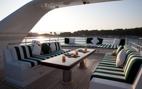 Table and sofas on deck of Dorothea III