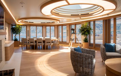 The interiors of Lurssen superyacht FLYING FOX feature neutral tones and freestanding furniture for a relaxed atmopshere