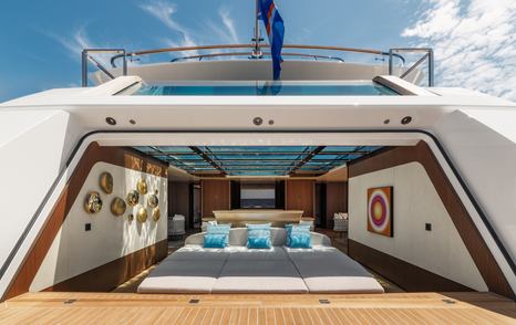 Sanlorenzo 74Steel superyacht Silver Fox beach club with integrated sunpads and glass bottom pool