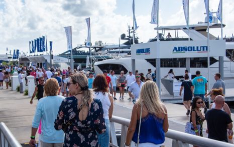 Overview of the docks at FLIBS with many visitors exploring