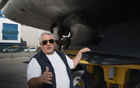 Alexei Mikhailov explaining stabilizers on the Bering B88 motor yacht 