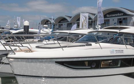 Line of motor yachts berthed at Swanwick marina