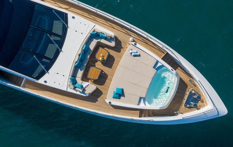 The foredeck has a sunpad/pool combination.