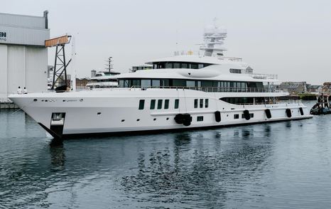 Amels 242 Superyacht Synthesis docked outside Damen shipyard post-refit