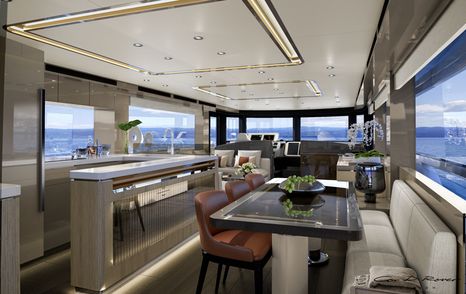 Dining area and galley of salon in Sirena 68