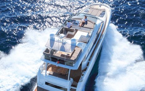 Prestige 630 flybridge yacht running shot