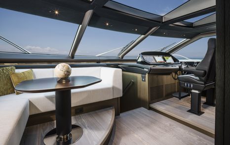 Helm station and seating area on Sunseeker 90 Ocean