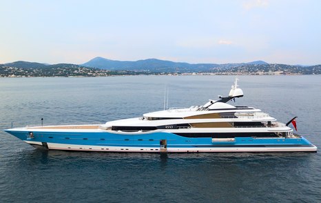 Feadship superyacht Madame Gu at anchor side view 