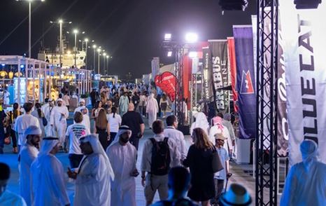 Abu Dhabi International Boat Show night time crowd shot