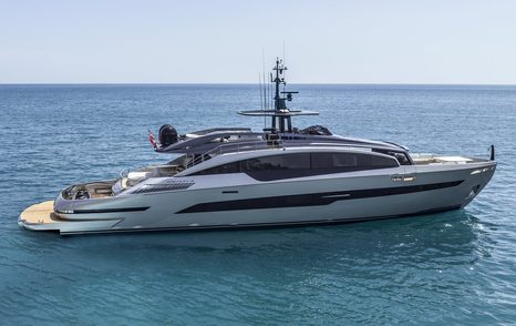Pershing GTX116 motor yacht at anchor side view 