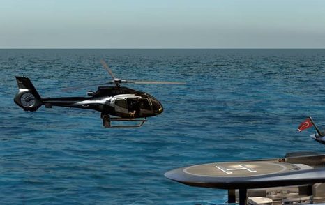 Mengi Yay superyacht Amphib II at anchor view of helipad 