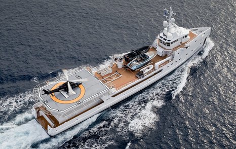 DALOOB making way at sea, showcasing its expansive deck space complete with a helipad