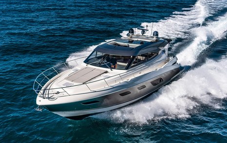 Riviera 6000 Sport Yacht Platinum Edition underway front view 