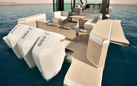 Saxdor 460 GTC boat stern with fold down aft and white outboards 