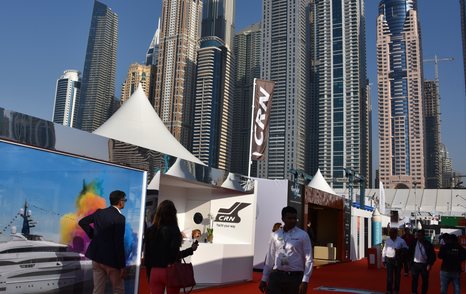 Dubai International Boat Show red walkway, skyscrapers in background