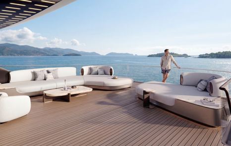 Rendering of ISA Large Yacht Collection Essence 82m superyacht aft decks seating with man overlooking sea 