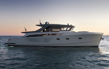 Bluegame BGX73 motor yacht at anchor side view 