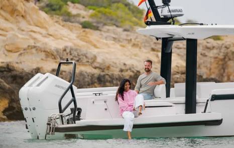 Couple on cockpit of Axopar 38 Sun Top boat 