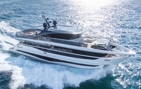 Princess X95 Vista flybridge yacht underway bow view 
