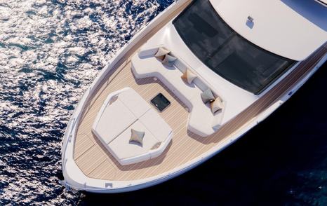 Aerial view of Majesty 60 Motor Yacht foredeck with integrated seating