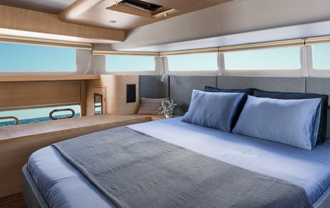 CGI of double bed in cabin on Aquila 54