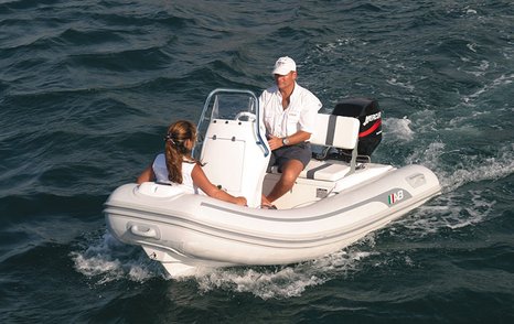 Couple on small RIB tender