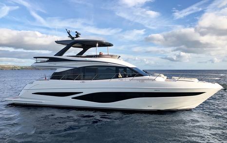 Princess F65 motor yacht at anchor side view