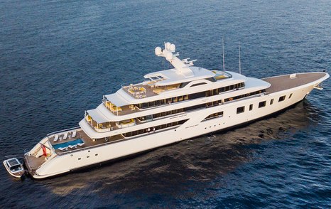 Motor yacht Aquarius at anchor side view