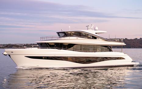 Princess X80 flybridge yacht underway side view 