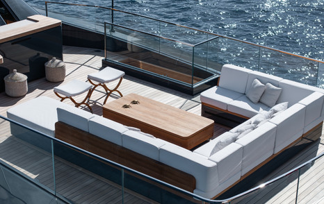 The flybridge onboard SAN offers comfortable U-shaped seating