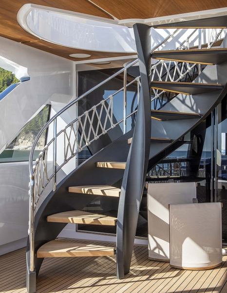 Motor yacht Numero Dix bridge aft deck curled staircase