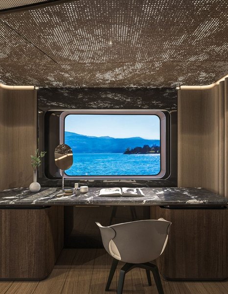 Rendering of Sirena 42M superyacht master cabin vanity area with marbled desk 