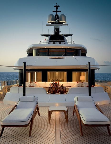 CRN Superyacht Amor à Vida foredeck with shaded seating and white furniture 