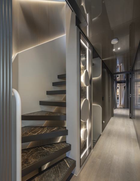 Columbus Atlantique 38M Superyacht Principessa Capricciosa lobby with marbled staircase and integrated LEDS