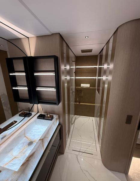 solaris-power-70-long-range-owners-bathroom-with-stone-vanity-and-walk-in-shower