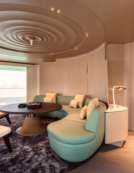 Explorer Yacht RJ main saloon dining area with curved seating 