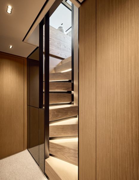 Sanlorenzo SL86A motor yacht interior stairway with wooden finishes