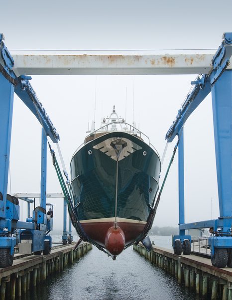 Boat lift facilities within a marina