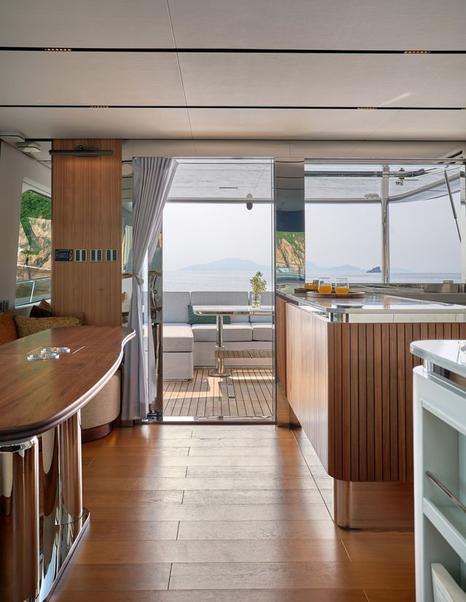CL Yachts CLB65 SUV Motor Yacht salon with wooden bar and table 