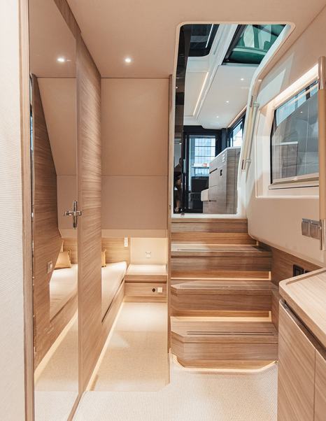 Saxdor-460-GTC-Review-lower-deck-corridor-companionway-steps-to-main-deck