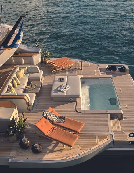 Close up rendering of Oasis 40M aft with large swimming pool and sunbeds 