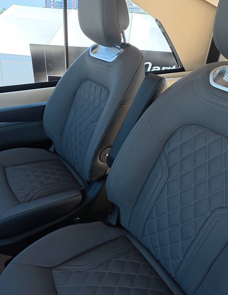 Maritimo M50 helm seating with adjustable helm chairs and stitched upholstery detail