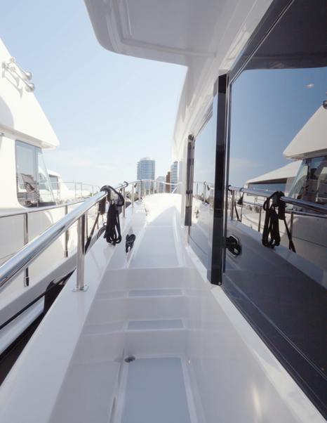 Nordhavn 75 EYF full walkaround side deck with wide side passage and raised pilothouse access