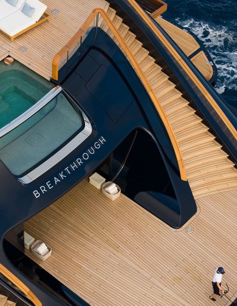 Aerial view of Superyacht Breakthrough name plate and infinity pool