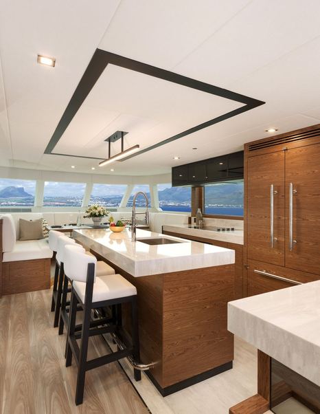 Horizon V77S Hull 13 motor yacht galley bar and dining area with overhead LED lighting