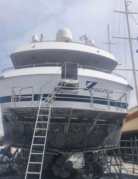 Superyacht Zanzoun stern at Marine Group Yachting International  refit facility