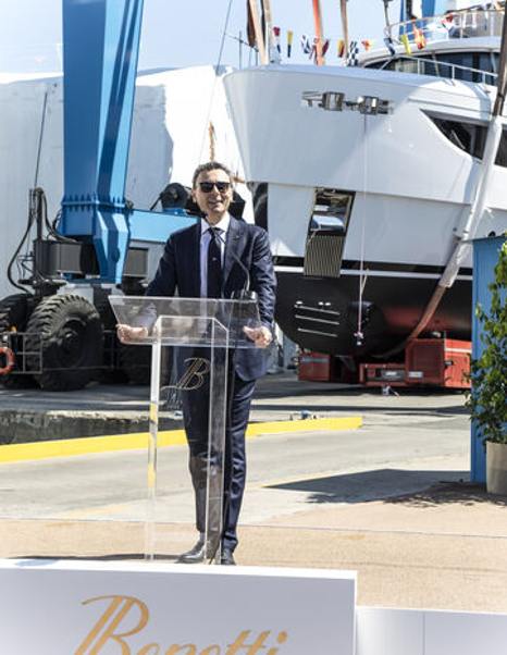 Benetti CEO Marco Valle giving a speech at podium during celebration of the launch in Viareggio