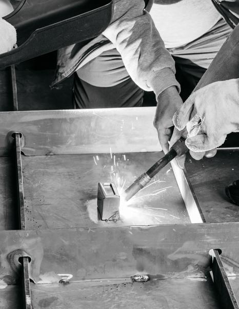 Welding of Second Bering 165 Explorer Yacht hull in black and white