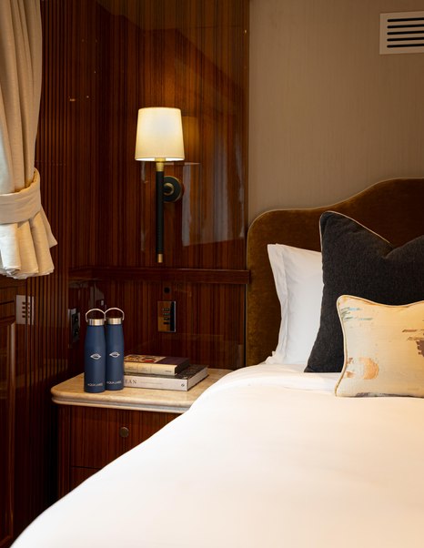 Aqua Lares superyacht cabin bed close up 