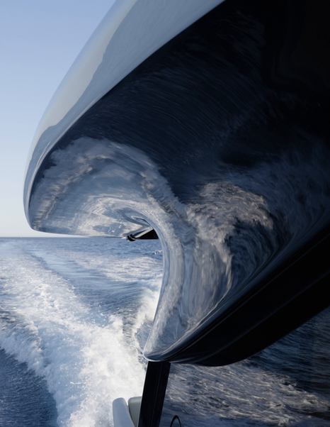 Solaris-Power-60-Coupe-Review-side-decks-underway-showing-spray-pattern